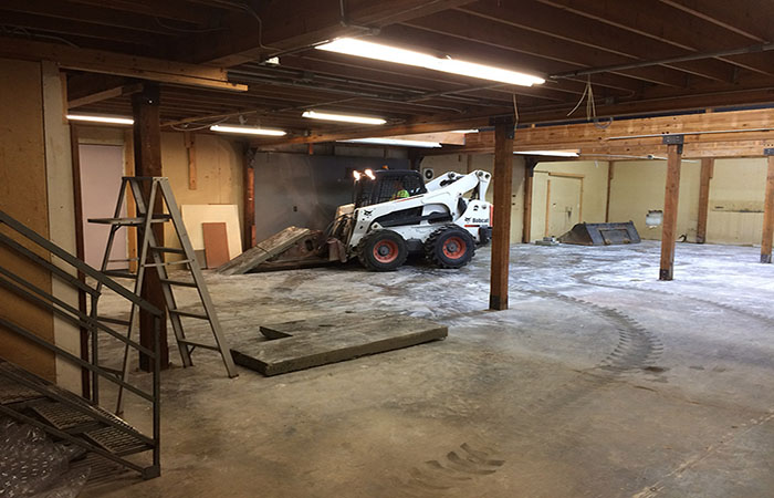 Taking out the old concrete floor